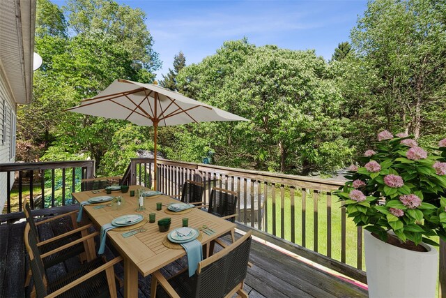 62 Buena Vista Rd, New City, NY 10956 - wooden terrace featuring outdoor dining area and a lawn
