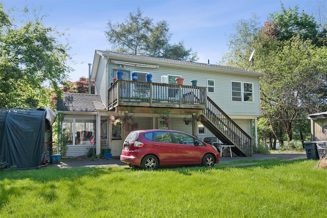 62 Buena Vista Rd, New City, NY 10956 - back of house with a lawn and a wooden deck