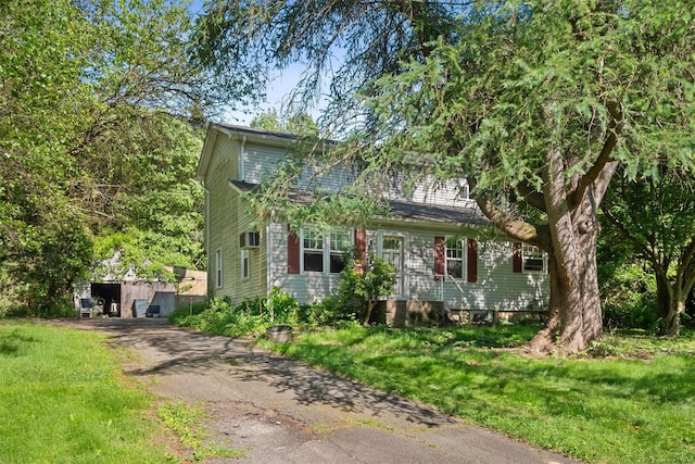 62 Buena Vista Rd, New City, NY 10956 - view of front facade with a front yard and driveway