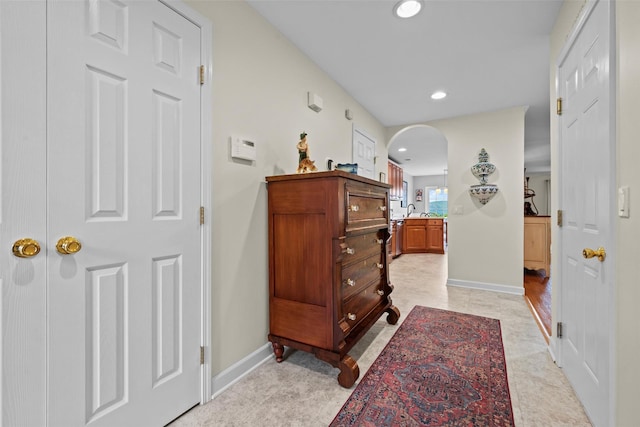 5005 John Hancock Ct Unit 100, New Windsor, NY 12553 - hall with arched walkways, recessed lighting, and baseboards