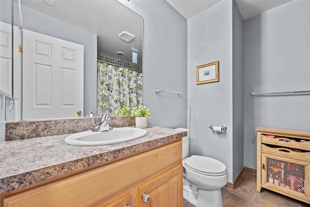 5005 John Hancock Ct Unit 100, New Windsor, NY 12553 - full bath with vanity, toilet, tile patterned flooring, and baseboards