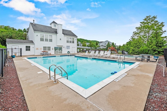 5005 John Hancock Ct Unit 100, New Windsor, NY 12553 - community pool featuring a patio