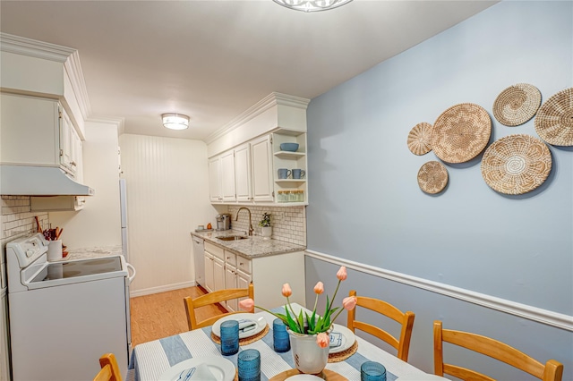 199 Millard Ave Unit 199, West Babylon, NY 11704 - kitchen with white appliances, a sink, under cabinet range hood, backsplash, and light wood-style flooring