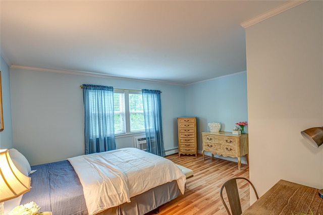 199 Millard Ave Unit 199, West Babylon, NY 11704 - bedroom featuring light wood-type flooring, a baseboard heating unit, and crown molding