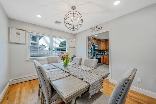 130 W 7th St, Deer Park, NY 11729 - dining area featuring a chandelier, baseboard heating, baseboards, light wood-style flooring, and recessed lighting