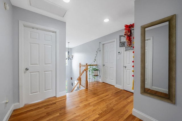 130 W 7th St, Deer Park, NY 11729 - corridor featuring an upstairs landing, light wood-style flooring, baseboards, and recessed lighting