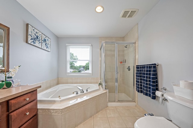 130 W 7th St, Deer Park, NY 11729 - bathroom featuring a jetted tub, toilet, a stall shower, and tile patterned floors