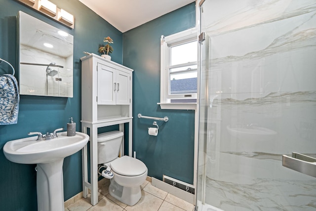 130 W 7th St, Deer Park, NY 11729 - bathroom with a marble finish shower, toilet, tile patterned flooring, and baseboards