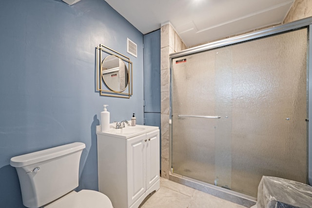130 W 7th St, Deer Park, NY 11729 - bathroom featuring vanity, toilet, a stall shower, and tile patterned flooring