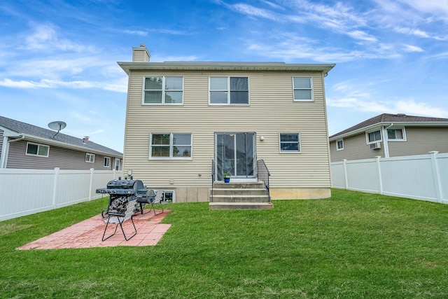130 W 7th St, Deer Park, NY 11729 - back of house featuring entry steps, a chimney, and a patio
