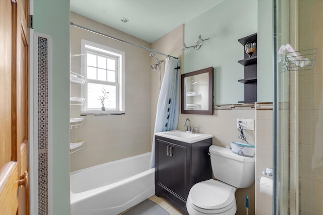 200-12 36th Ave, Bayside, NY 11361 - full bath featuring toilet, shower / bathtub combination with curtain, vanity, and tile walls