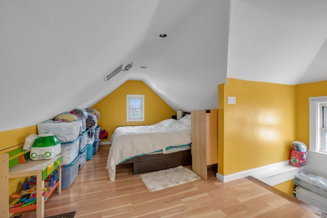 200-12 36th Ave, Bayside, NY 11361 - bedroom featuring lofted ceiling, wood finished floors, and baseboards
