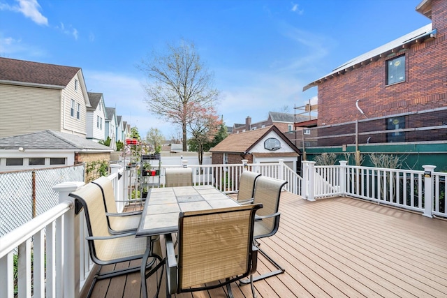 200-12 36th Ave, Bayside, NY 11361 - wooden terrace featuring a residential view and outdoor dining area