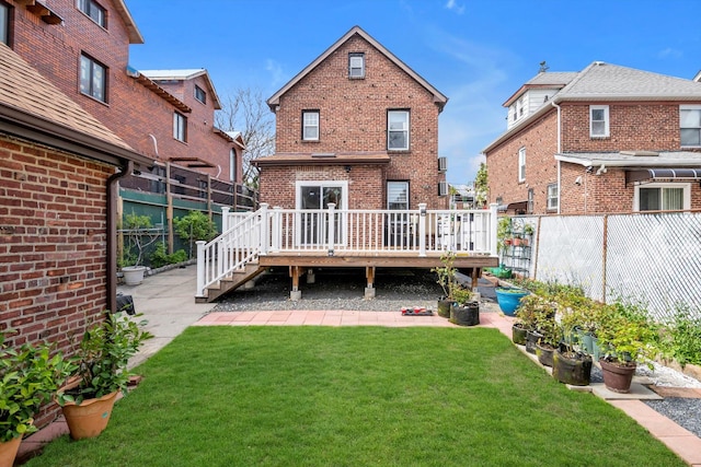 200-12 36th Ave, Bayside, NY 11361 - back of property with brick siding, a wooden deck, and stairs