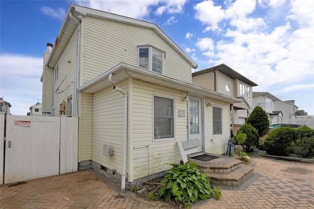 3680 Naomi St, Seaford, NY 11783 - view of front of house with a patio area