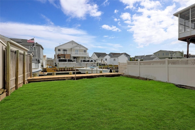 3680 Naomi St, Seaford, NY 11783 - view of yard with a residential view and a dock