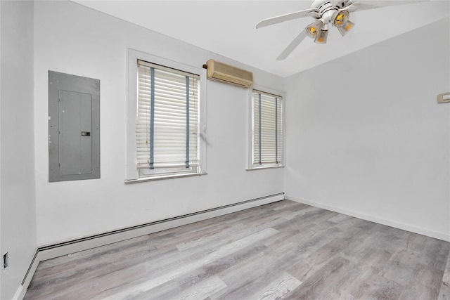 3680 Naomi St, Seaford, NY 11783 - empty room with electric panel, an AC wall unit, healthy amount of natural light, and wood finished floors