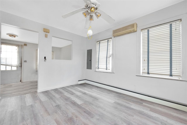 3680 Naomi St, Seaford, NY 11783 - unfurnished room with a wall unit AC, baseboard heating, wood finished floors, electric panel, and a ceiling fan