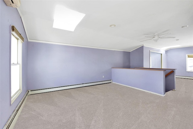3680 Naomi St, Seaford, NY 11783 - additional living space with carpet floors, a baseboard heating unit, and healthy amount of natural light