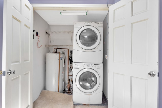 3680 Naomi St, Seaford, NY 11783 - laundry room featuring water heater and stacked washer / drying machine