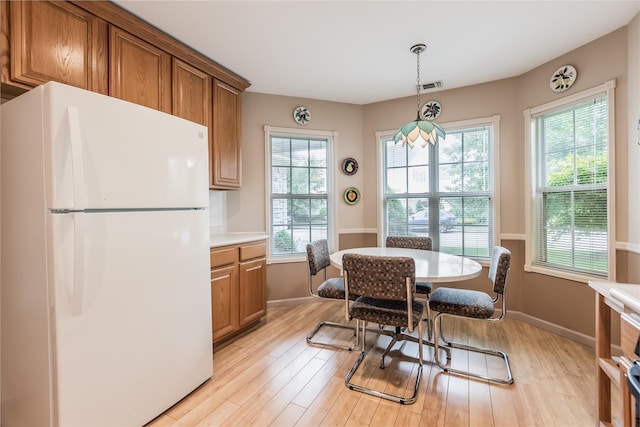 75 Madison Cir, Middle Island, NY 11953 - dining area featuring light wood finished floors and baseboards