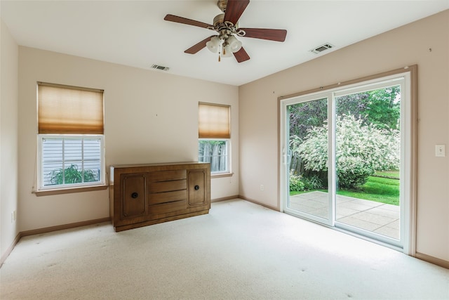 75 Madison Cir, Middle Island, NY 11953 - carpeted spare room with baseboards and a ceiling fan