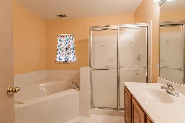 75 Madison Cir, Middle Island, NY 11953 - full bath featuring a stall shower, vanity, a garden tub, and tile patterned flooring