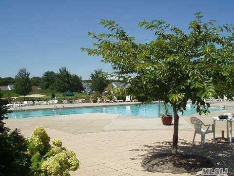 75 Madison Cir, Middle Island, NY 11953 - community pool featuring a patio