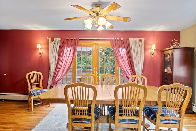 13 Evans Ave, Albertson, NY 11507 - dining room featuring wood finished floors, ceiling fan, and french doors