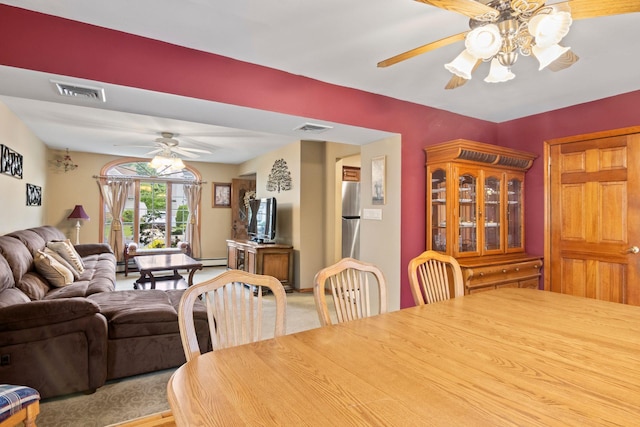13 Evans Ave, Albertson, NY 11507 - dining space with a ceiling fan and a baseboard heating unit