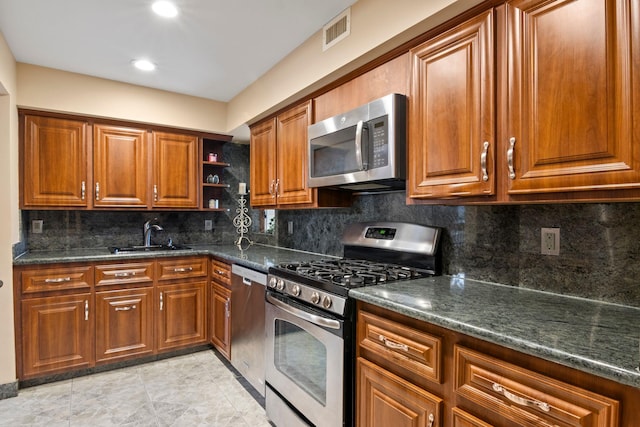 13 Evans Ave, Albertson, NY 11507 - kitchen featuring stainless steel appliances, a sink, brown cabinetry, open shelves, and backsplash