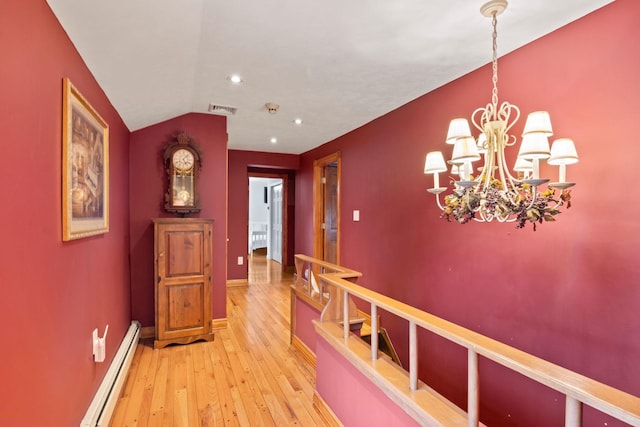 13 Evans Ave, Albertson, NY 11507 - corridor featuring baseboard heating, a chandelier, light wood finished floors, recessed lighting, and baseboards