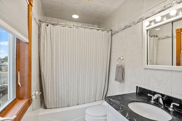 13 Evans Ave, Albertson, NY 11507 - bathroom with vanity, toilet, shower / bath combo with shower curtain, and tile walls