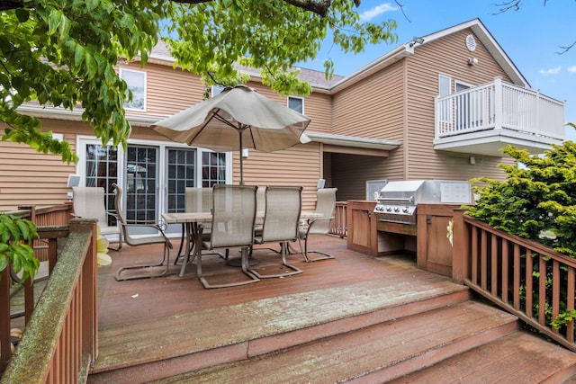 13 Evans Ave, Albertson, NY 11507 - wooden terrace with outdoor dining space and a grill