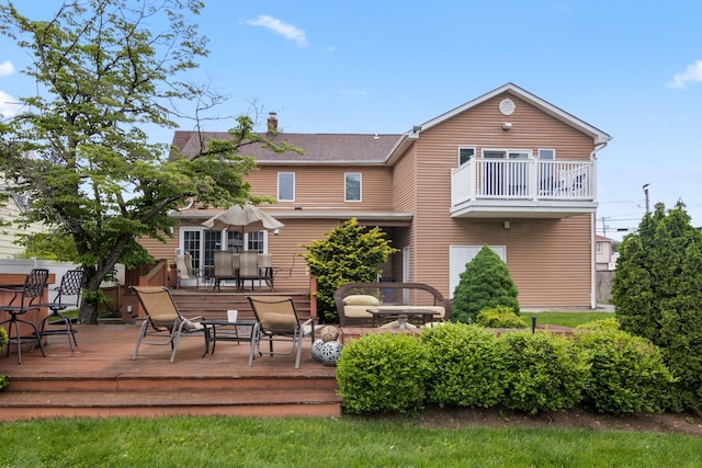 13 Evans Ave, Albertson, NY 11507 - rear view of property featuring a deck, a chimney, and a balcony