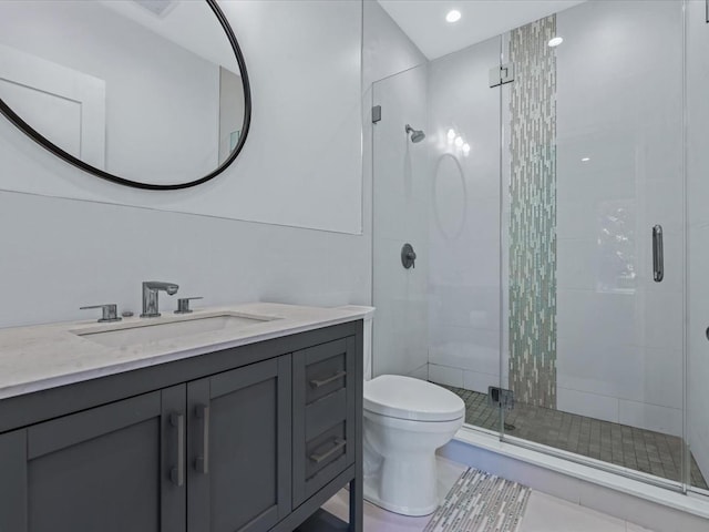 15 Grenfell Dr, Great Neck, NY 11020 - bathroom with toilet, vanity, a shower stall, and recessed lighting