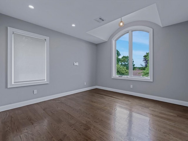 15 Grenfell Dr, Great Neck, NY 11020 - unfurnished room featuring dark wood finished floors, baseboards, recessed lighting, and vaulted ceiling