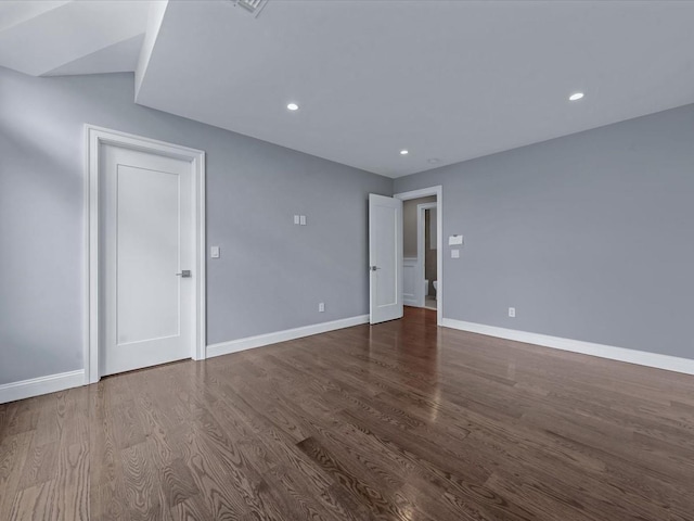 15 Grenfell Dr, Great Neck, NY 11020 - spare room with dark wood-style flooring, baseboards, and recessed lighting