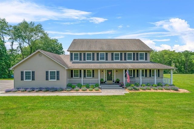 17 Jackson Ln, Campbell Hall, NY 10916 - colonial-style house with covered porch, a front yard, and a shingled roof
