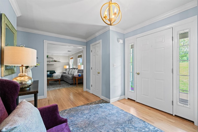 17 Jackson Ln, Campbell Hall, NY 10916 - foyer featuring healthy amount of natural light, wood finished floors, a chandelier, and crown molding