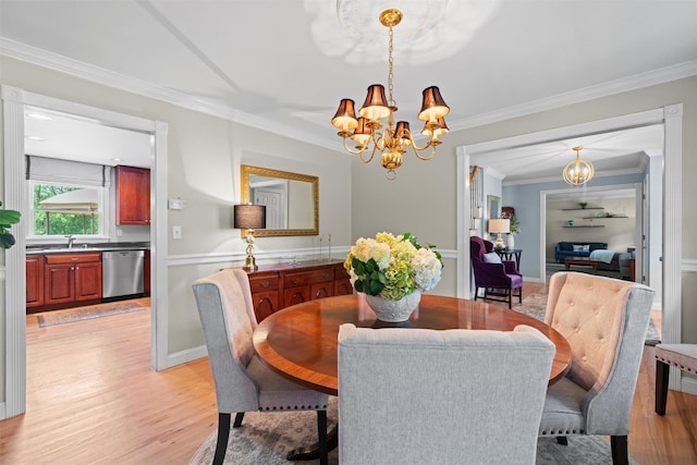 17 Jackson Ln, Campbell Hall, NY 10916 - dining area featuring a chandelier, crown molding, and light wood-type flooring