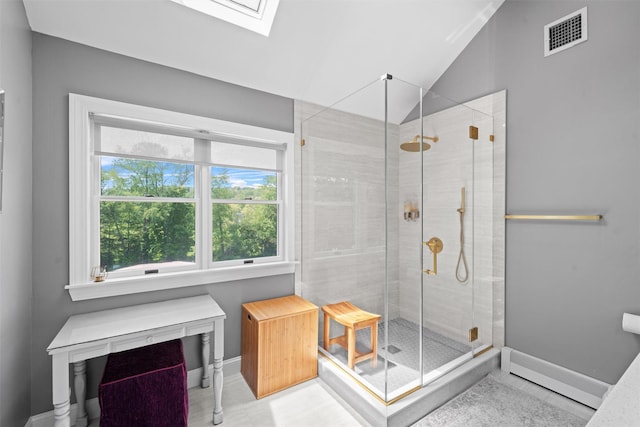 17 Jackson Ln, Campbell Hall, NY 10916 - bathroom featuring a skylight, a shower stall, lofted ceiling, a baseboard radiator, and tile patterned flooring
