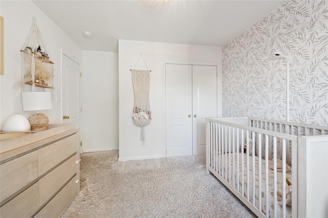 149 Monroe Blvd Unit 149, Long Beach, NY 11561 - carpeted bedroom with wallpapered walls, a closet, and baseboards