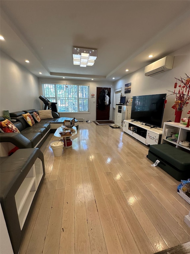 5224 66th St, Maspeth, NY 11378 - living area with a raised ceiling, a wall mounted AC, light wood-type flooring, and recessed lighting