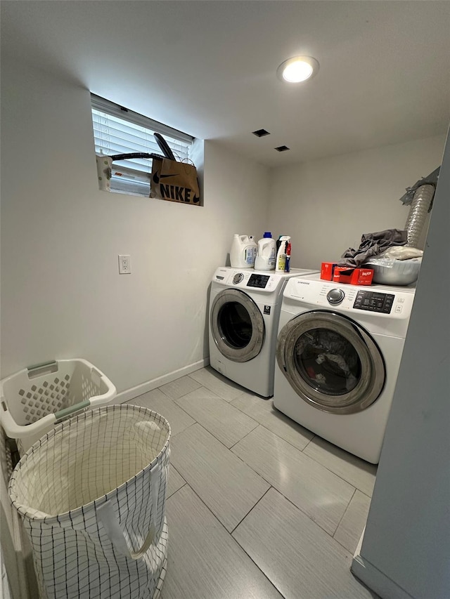 5224 66th St, Maspeth, NY 11378 - laundry area featuring washing machine and clothes dryer and baseboards
