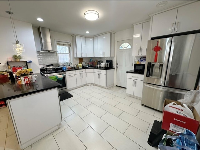 5224 66th St, Maspeth, NY 11378 - kitchen featuring stainless steel appliances, wall chimney range hood, tasteful backsplash, dark countertops, and recessed lighting