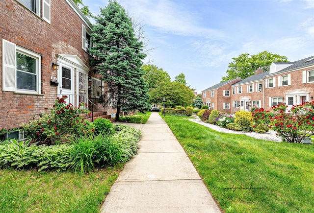 110-25 64th Rd Unit 10, Forest Hills, NY 11375 - view of home's community with a yard and a residential view