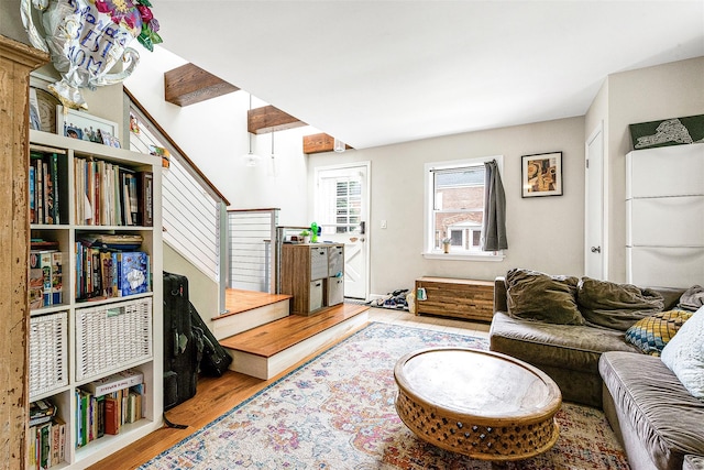 110-25 64th Rd Unit 10, Forest Hills, NY 11375 - living area with stairway and wood finished floors