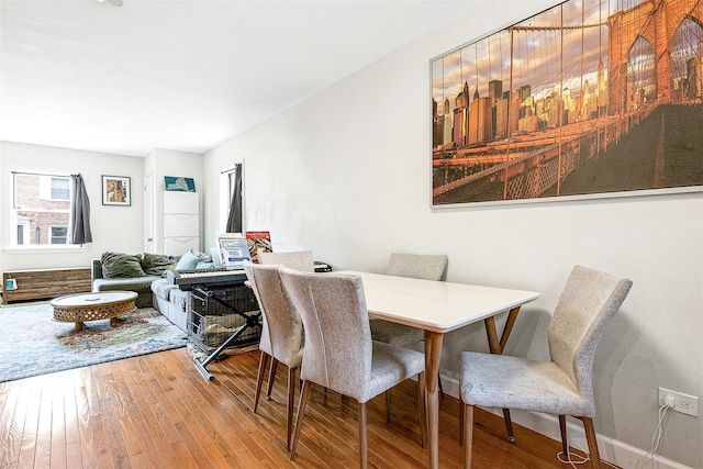 110-25 64th Rd Unit 10, Forest Hills, NY 11375 - dining room with wood-type flooring