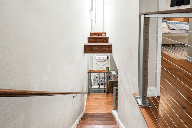 110-25 64th Rd Unit 10, Forest Hills, NY 11375 - stairway with wood finished floors and baseboards